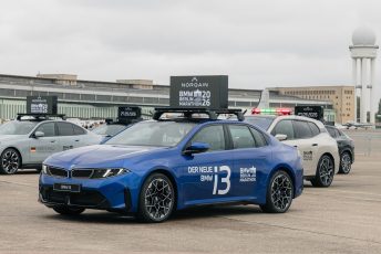 The new BMW i3 served as the official lead vehicle for the men's elite race at the 2026 BMW Berlin Marathon. (Credit: BMW Group)